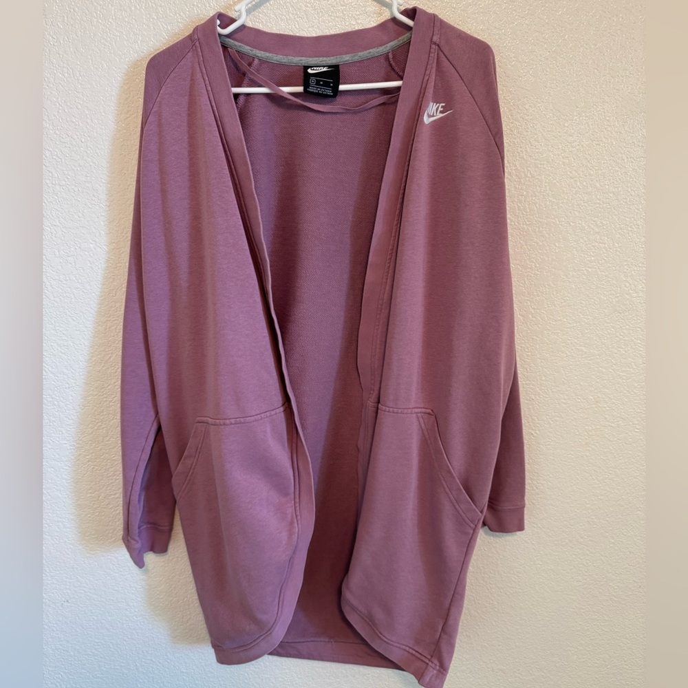 Woman’s purple Nike cardigan